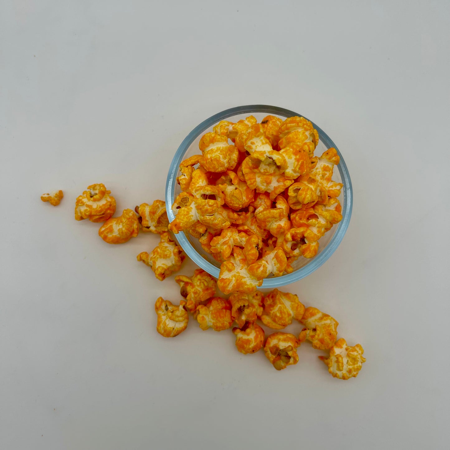 Rich and savory cheddar sour cream popcorn. Reminiscent of your favorite wavy potato chips.