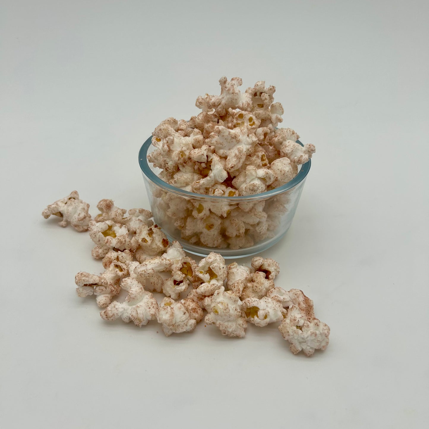 Sweet cinnamon sprinkled over light and fluffy kernels