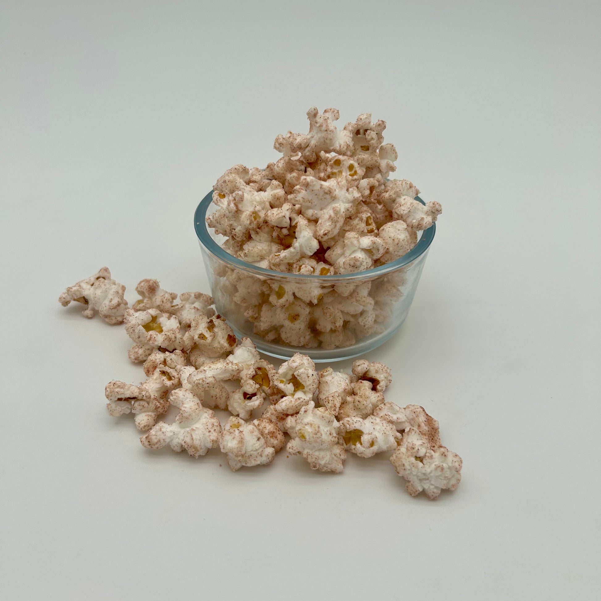 Sweet cinnamon sprinkled over light and fluffy kernels