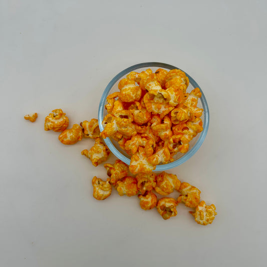 Rich and savory cheddar sour cream popcorn. Reminiscent of your favorite wavy potato chips. 