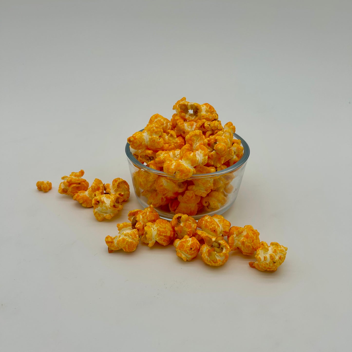 Rich and savory cheddar sour cream popcorn. Reminiscent of your favorite wavy potato chips