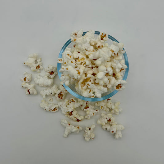 Light, tender, crunchy white cheddar popcorn. 